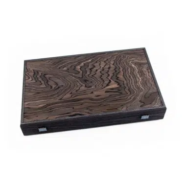 Coffret de backgammon fermé en placage d'ébène aux veines marbrées