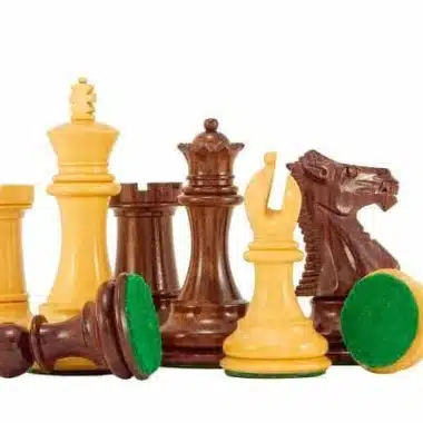 Pièces en bois de rose et érable posées, bases en feutrine vert visibles