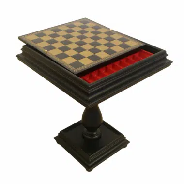 Table d'échecs en bois noir ouverte, plateau échiquier et rangement rouge visibles